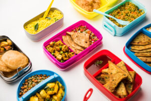 group lunch box tiffin indian kids showing variety multiple option combination healthy food your school going children