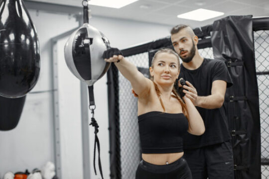 woman boxing beginner gym lady black sportwear woman with coach