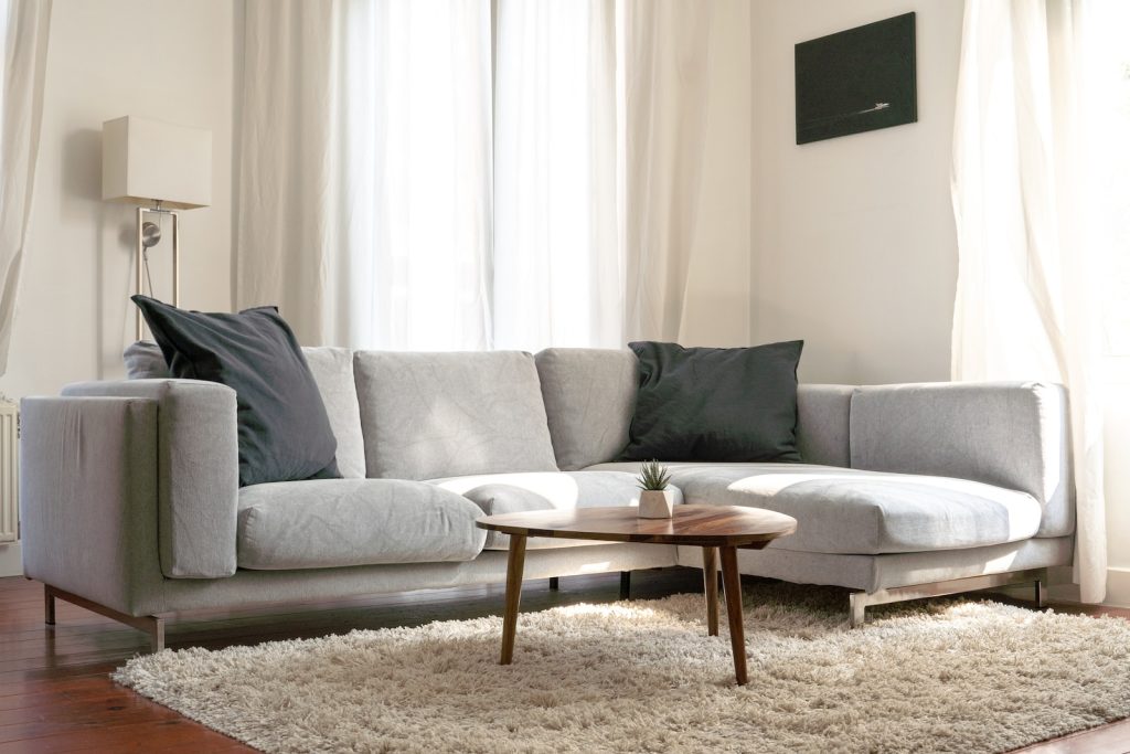 couch gray sofa with throw pillows